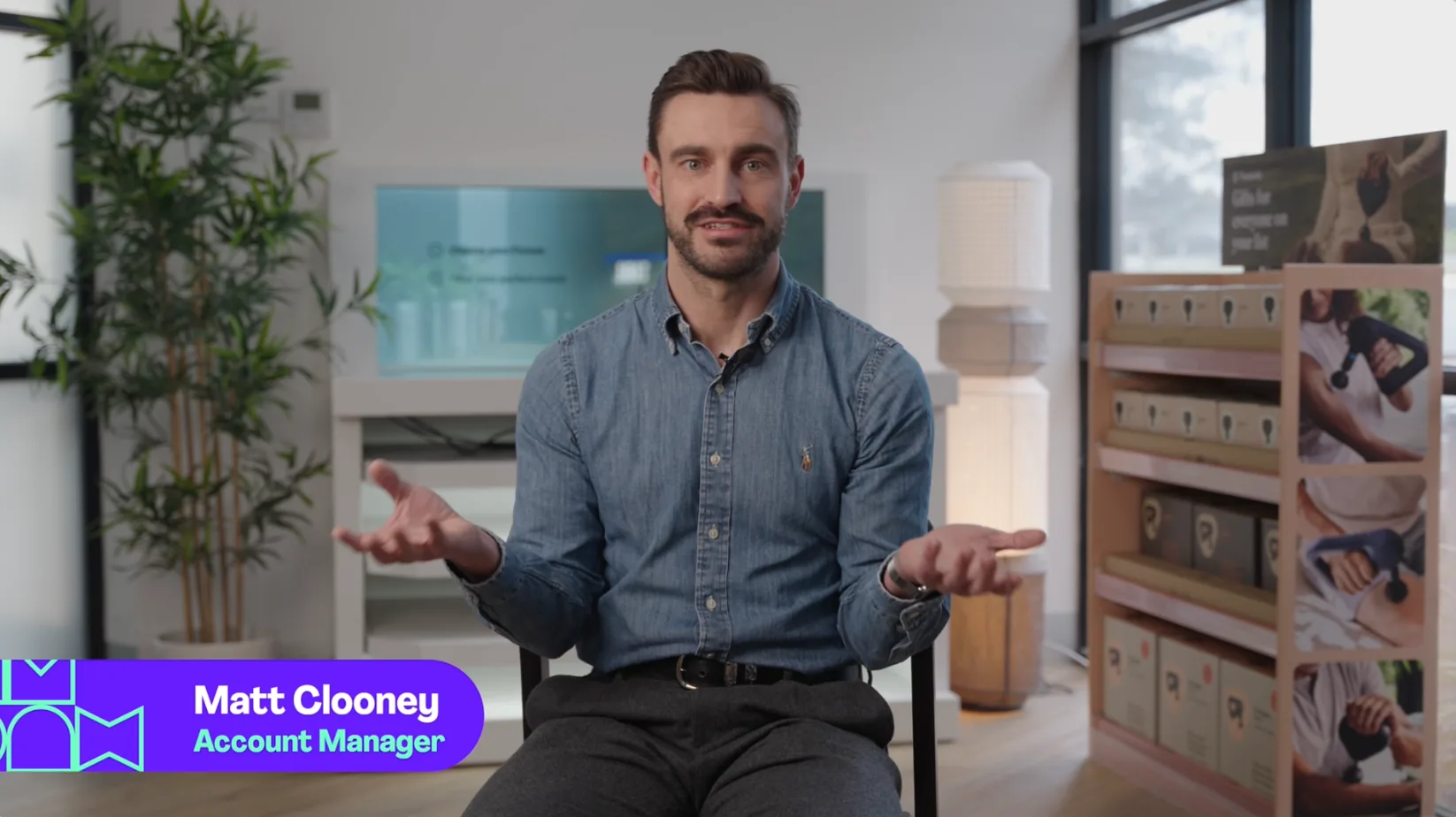 Matt Clooney, Account Manager, speaking to camera in a product showroom