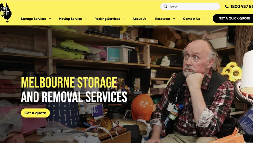 1800 We Store It website: “Melbourne Storage and Removal Services” over a man sitting among stored boxes